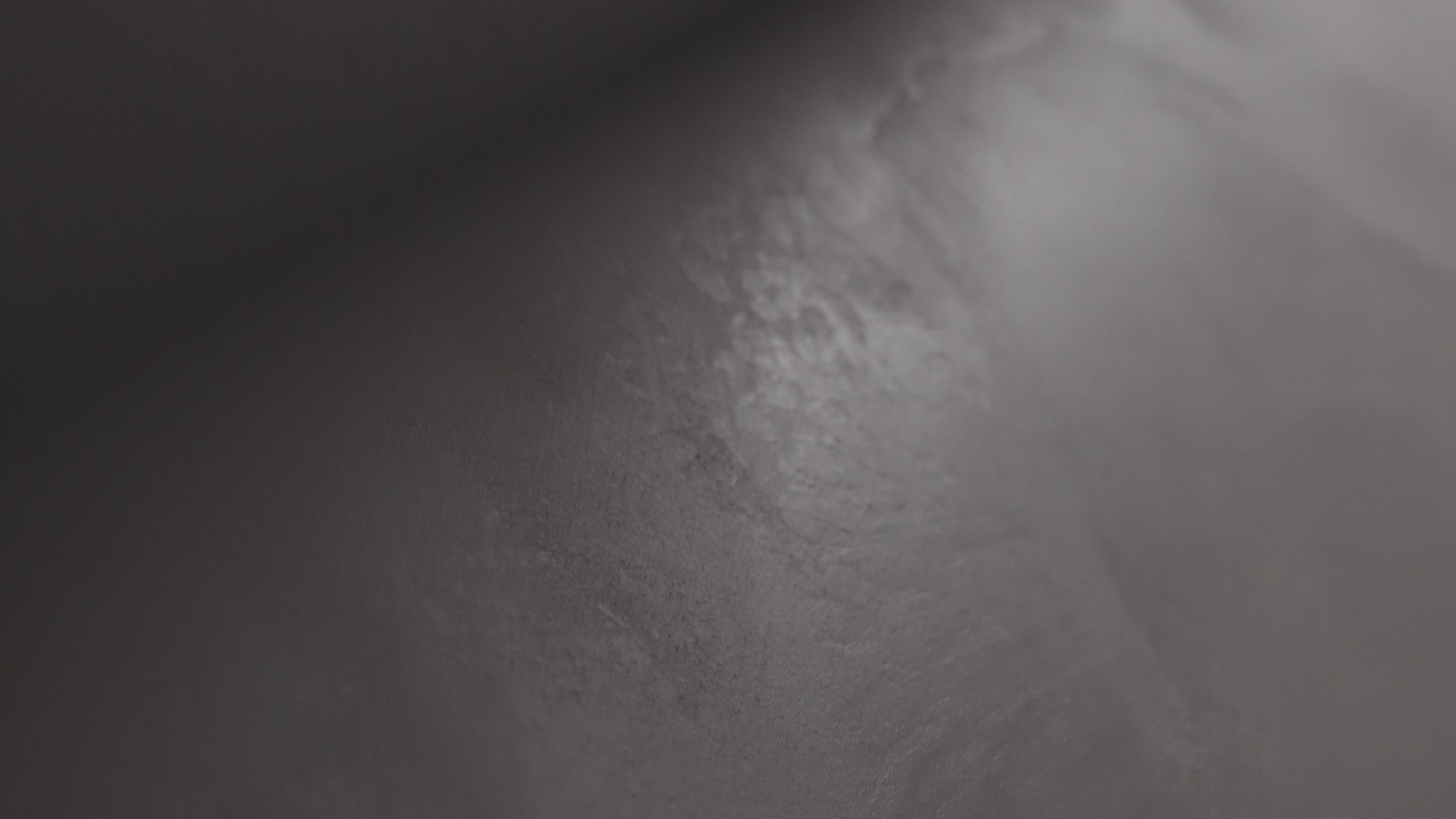 VIOLANTE Rialto matte lime plaster texture closeup in natural gray